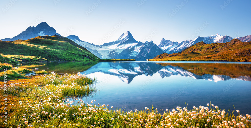 Sunrise view on Bernese range above Bachalpsee lake. Peaks Eiger, Jungfrau,Faulhorn in famous location. Switzerland alps, Grindelwald valley