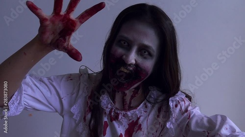 Female zombie,asian woman makeup to zombie in Halloween festival.