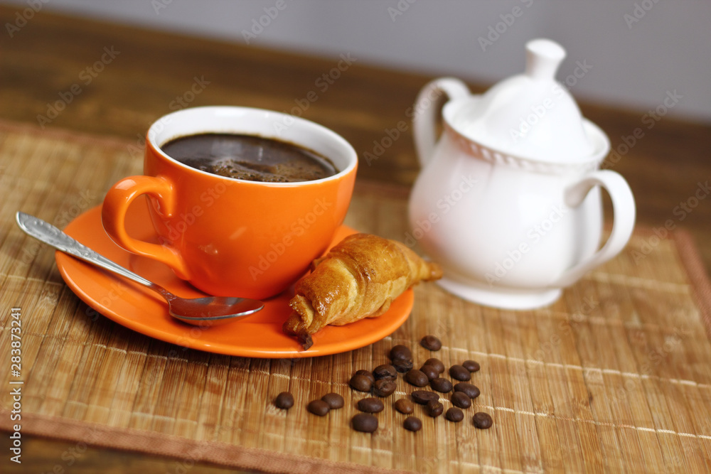 Fototapeta premium Coffee Cup and Croissant Cookie. Breakfast.
