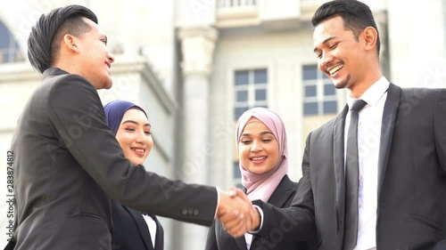 Business people hand shaking
