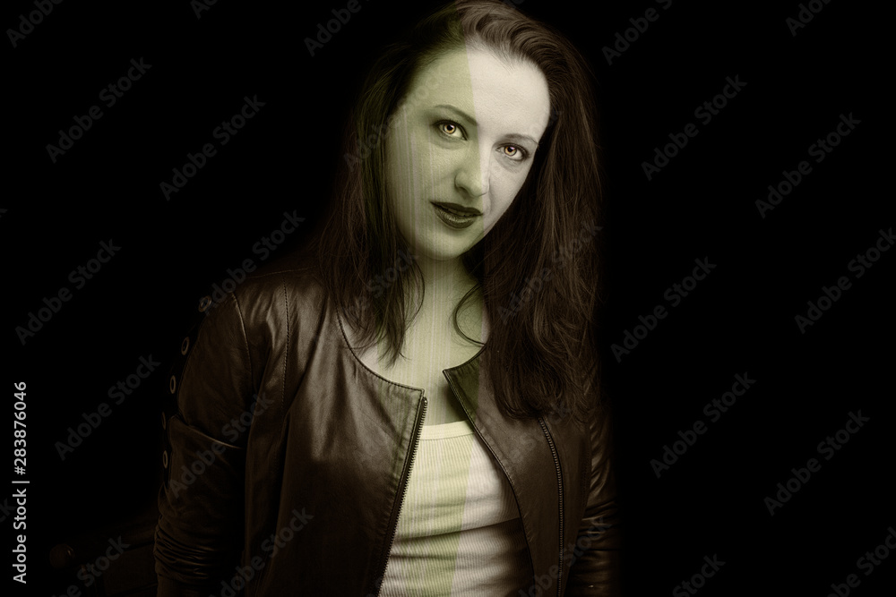 Beautiful dark girl  in rock style on a black background.