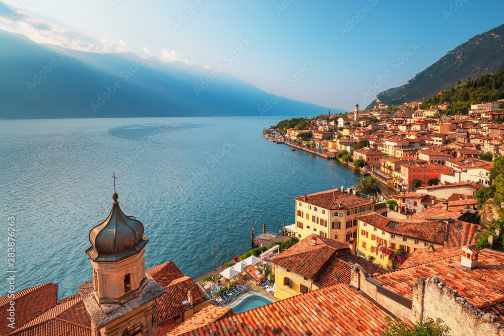 Scenic view on Lake Garda  in Limone sul Garda town, famous tourist destination in Italy