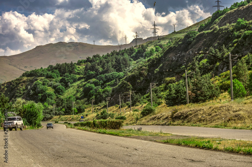 Winding road in the mountains with descent leading to lake Sevan in Gegharkunik region of Armenia