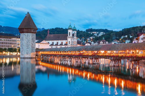 Sunrise in historic city center of Lucerne with famous Chapel Bridge and lake Lucerne (Vierwaldstattersee), Switzerland