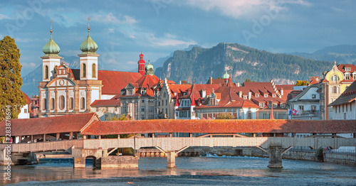 Sunrise in historic city center of Lucerne with famous Chapel Bridge and lake Lucerne (Vierwaldstattersee), Switzerland