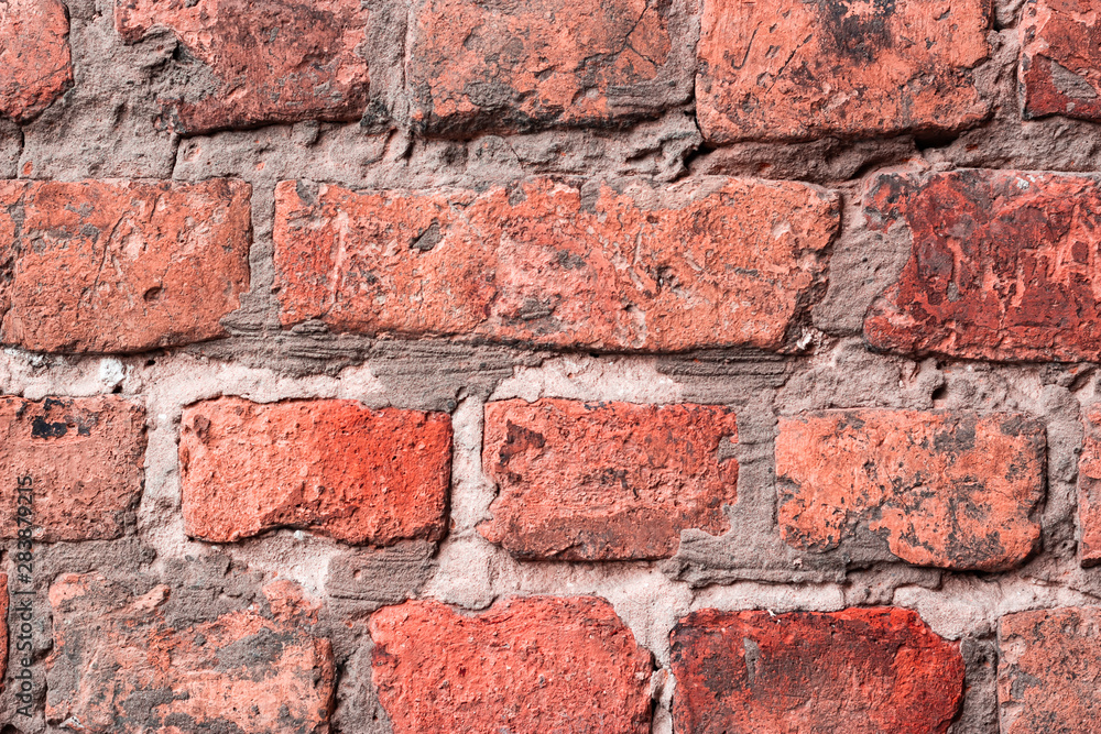 Obraz premium Old red brick wall. Place for text. The texture of the grunge wall.