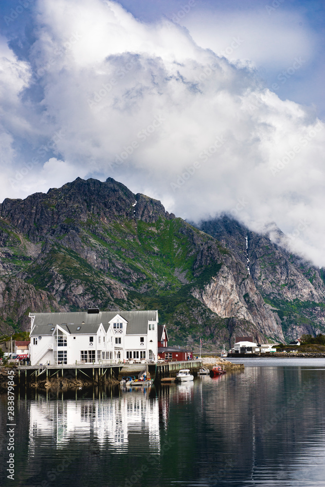 Henningsvær harbor, mountains and reflections