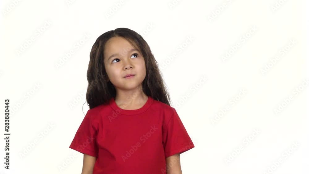 Portrait of girl posing and thinking about something on white background. Slow motion Portrait of girl posing and thinking about something on white background. Slow motion