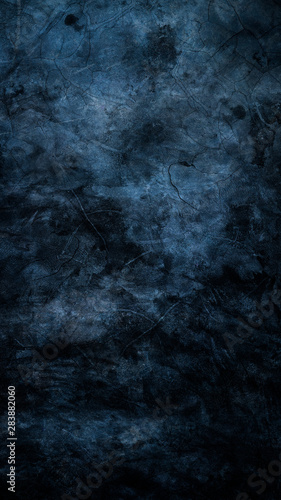Texture of black concrete wall, dark black background and blue light for graphic design
