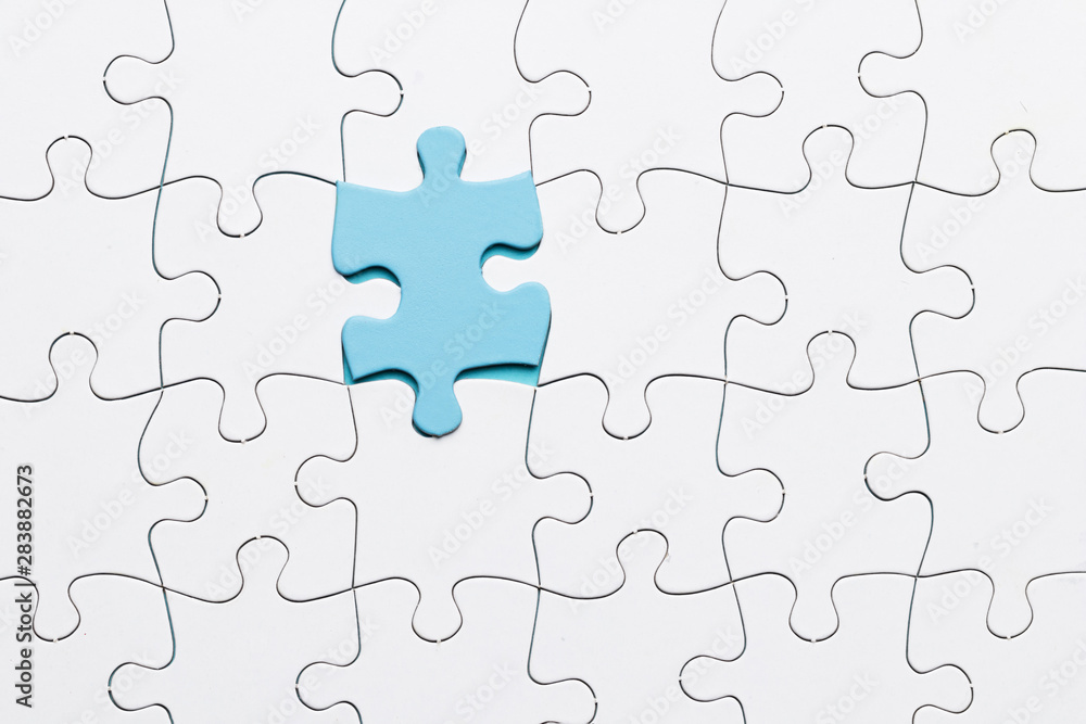 Blue piece puzzle connected with white piece backdrop Blue piece puzzle connected with white piece backdrop