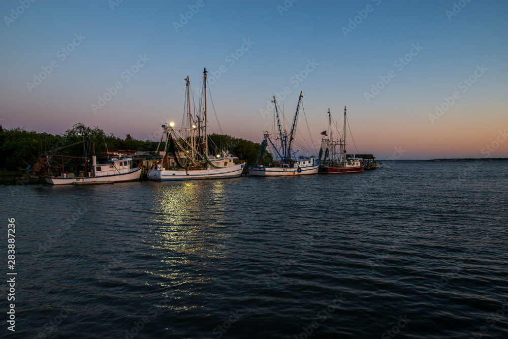 Sunset over the fishing boats along the South Carolina coast