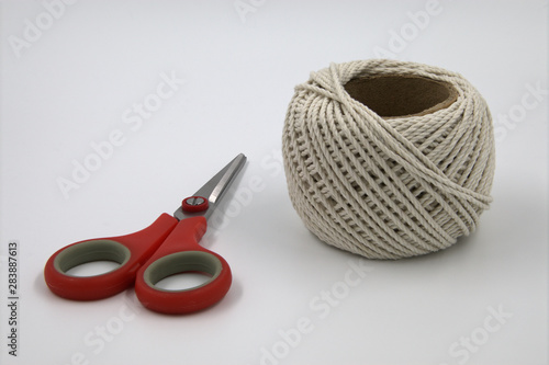 scissors and ball of yarn