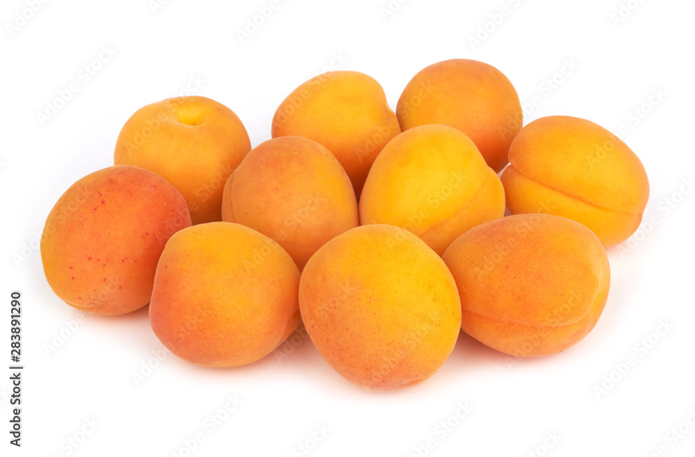 Apricots heap on white