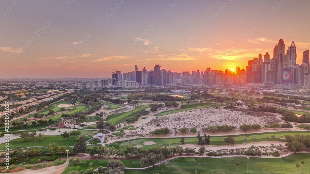 Dubai Marina skyscrapers and golf course sunset timelapse, Dubai, United Arab Emirates