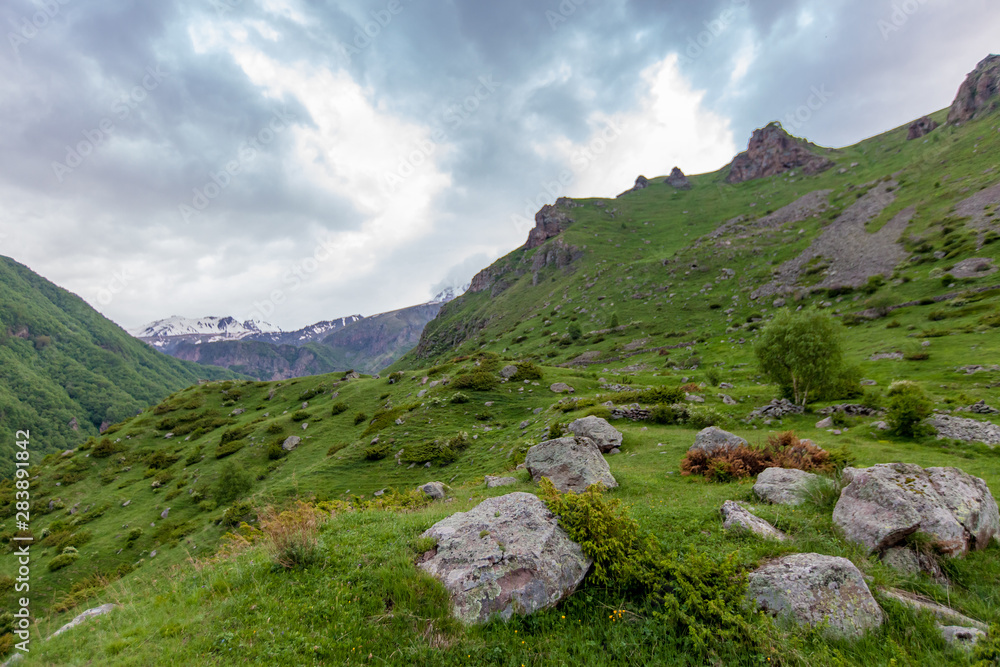 Mountains rocks landscape with cloudy dramatic sky Mountains rocks landscape with cloudy dramatic sky
