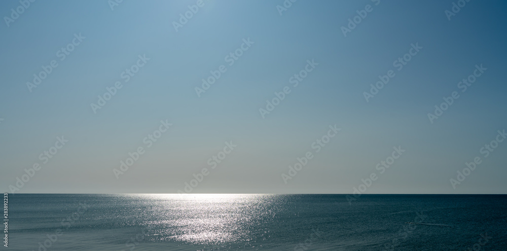 glare on the blue sea, seascape as background glare on the blue sea, seascape as background