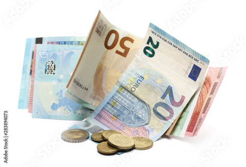 Euro banknotes with change, cash money and coins isolated on white background photo