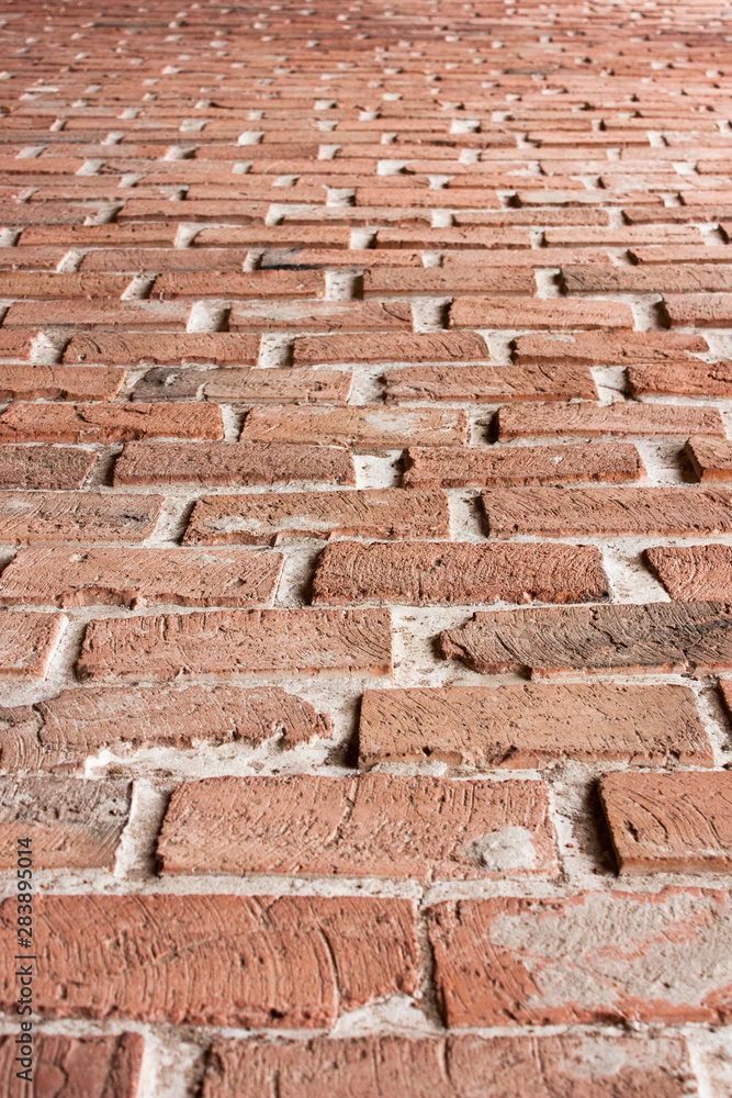 restored brick road, vertical perspective, selective focus restored brick road, vertical perspective, selective focus