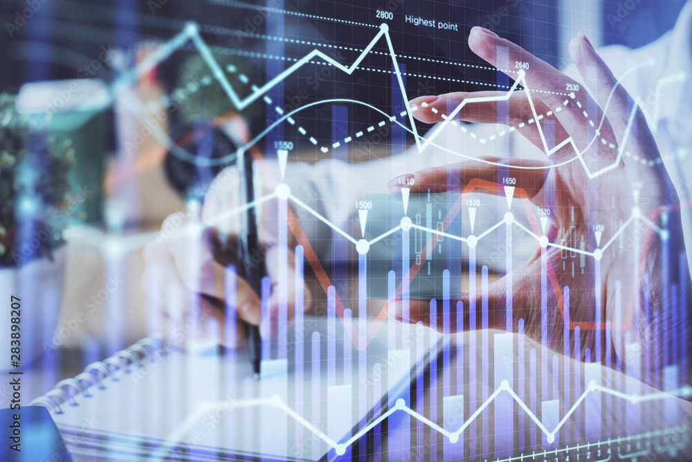 Forex chart displayed on woman's hand taking notes background. Concept of research. Multi exposure Forex chart displayed on woman's hand taking notes background. Concept of research. Multi exposure