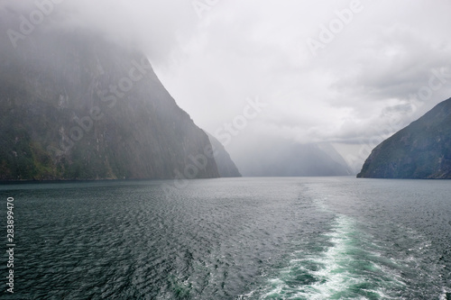Cloudy and rainy morning in Fjordland, New Zealand photo