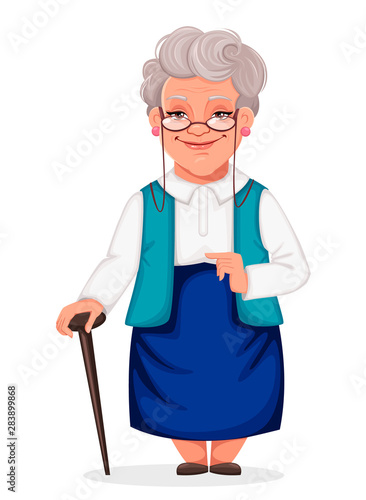 Cheerful grandmother stands with walking cane