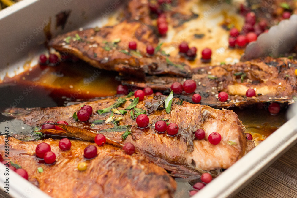 Grilled fish with spices and berries Grilled fish with spices and berries
