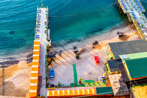 Beach huts and jetty in Sorrento, Campania, Italy photo