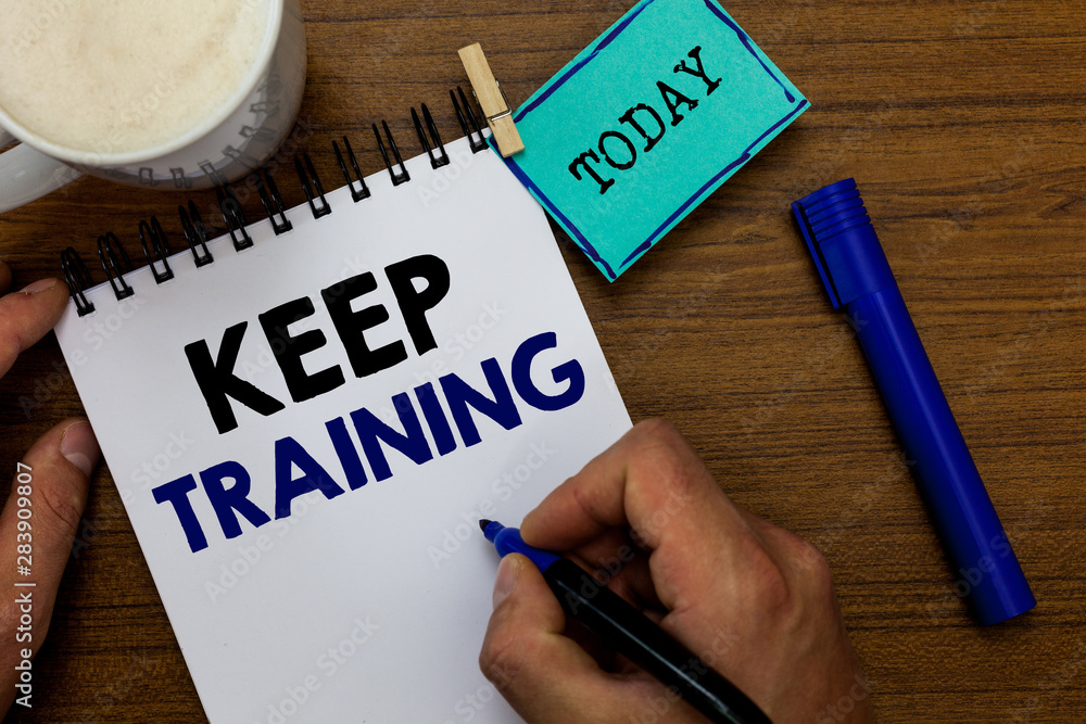 Writing note showing Keep Training. Business photo showcasing Grounding Drilling Always Wonder Be Curious Learn Man holding marker notebook clothespin reminder wooden table coffee Writing note showing Keep Training. Business photo showcasing Grounding Drilling Always Wonder Be Curious Learn Man holding marker notebook clothespin reminder wooden table coffee