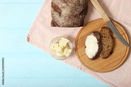 freshly baked bread and butter on the table. photo