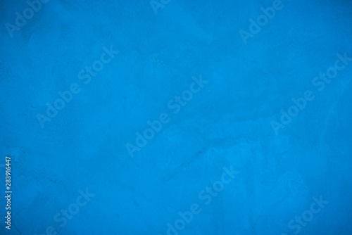 Abstract art pattern grunge blue cement or concrete wall texture background with empty space for text.