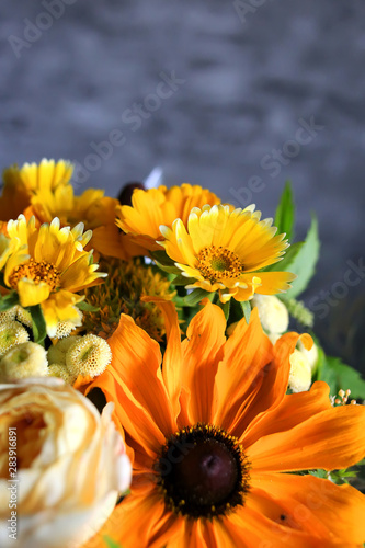 A beautiful bouquet of yellow flowers. Place for text. Congratulate with the holiday. Copy Space