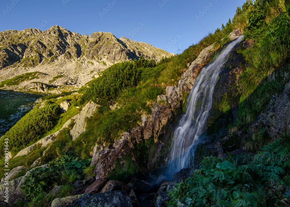 Small waterfall in Retezat National Park, Carpathian Mountains, Romania