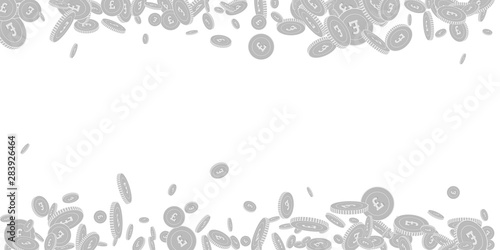 British pound coins falling. Scattered black and w