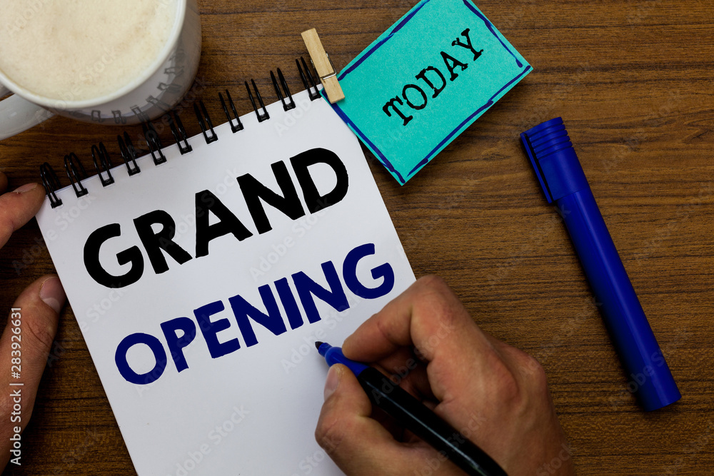 Writing note showing Grand Opening. Business photo showcasing Ribbon Cutting New Business First Official Day Launching Man holding marker notebook clothespin reminder wooden table coffee Writing note showing Grand Opening. Business photo showcasing Ribbon Cutting New Business First Official Day Launching Man holding marker notebook clothespin reminder wooden table coffee