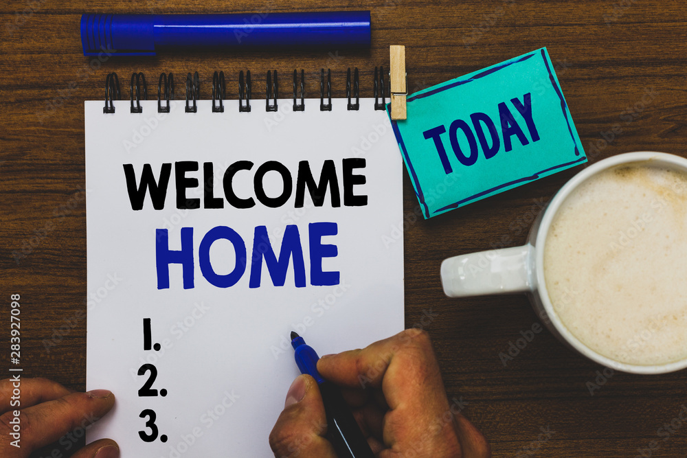 Conceptual hand writing showing Welcome Home. Business photo text Expression Greetings New Owners Domicile Doormat Entry Man holding marker notebook clothepin reminder wooden table coffee Conceptual hand writing showing Welcome Home. Business photo text Expression Greetings New Owners Domicile Doormat Entry Man holding marker notebook clothepin reminder wooden table coffee