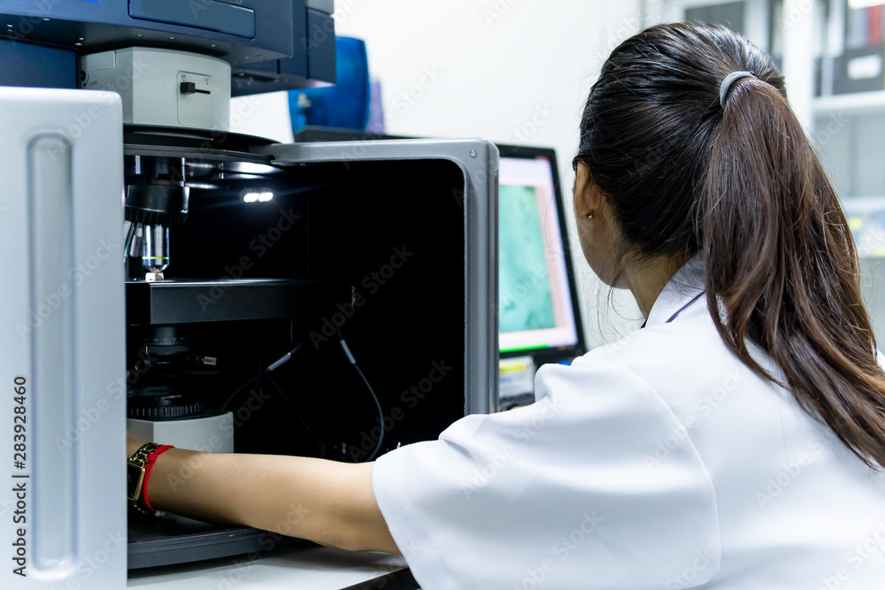 Asian scientist working in the lab,Experiment for customer,Using the formula, the physics and chemistry to calculate the value of the experiment,Thailand people Asian scientist working in the lab,Experiment for customer,Using the formula, the physics and chemistry to calculate the value of the experiment,Thailand people