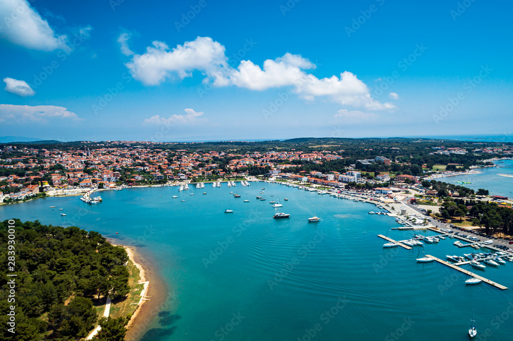 Aerial view from Medulin town and Medulin marina under beautiful blue sky with nice white clouds aerial view, Croatia