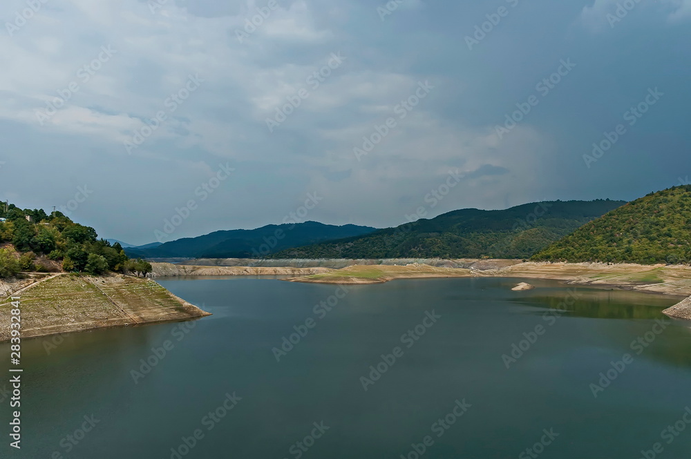 View of the Topolnitsa dam, reservoir, lake or barrage on the river Topolnitsa near village Muhovo, Ihtiman region, Bulgaria, Europe  