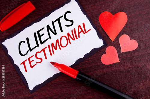 Conceptual hand writing showing Clients Testimonial. Business photo text Customers Personal Experiences Reviews Opinions Feedback written Sticky Note Paper wooden background Marker and Hearts