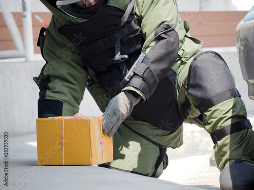 Bomb Disposal Expert in Bomb suit for Explosive ordnance disposal