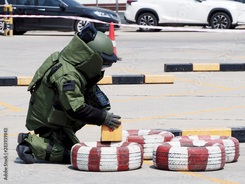 Bomb Disposal Expert in Bomb suit for Explosive ordnance disposal