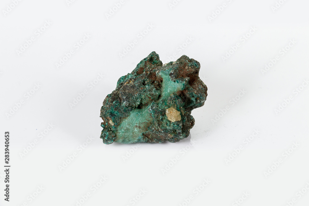 Macro mineral stone Malachite against white background Macro mineral stone Malachite against white background