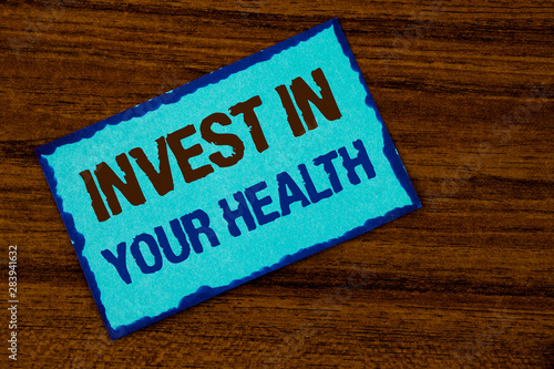 Text sign showing Invest In Your Health. Conceptual photo Spend money in personal healthcare Preventive Tests written Sticky note paper the Wooden background.