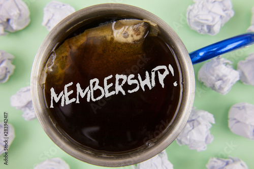 Text sign showing Membership. Conceptual photo Being member Part of a group or team Join organization company written Black Tea in Cup within Crumpled Paper Balls plain Green background.