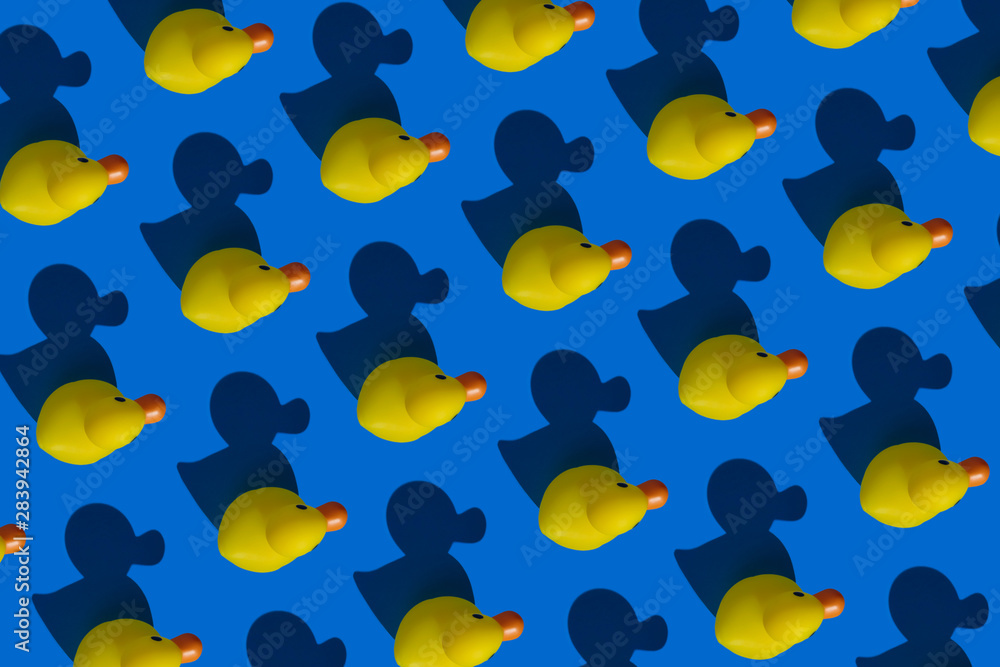 Pattern yellow rubber ducks and shadows Pattern yellow rubber ducks and shadows