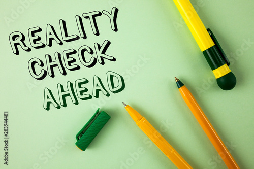 Word writing text Reality Check Ahead. Business concept for Unveil truth knowing actuality avoid being sceptical written Plain Green background Pens next to it.