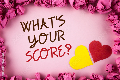 Word writing text What Is Your Score Question. Business concept for Tell Personal Individual Rating Average Results written plain background within Pink Paper Balls Hearts next to it.