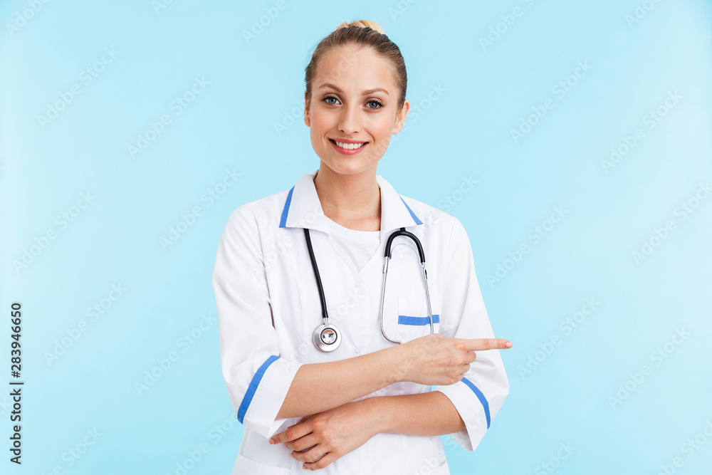 Beautiful blonde woman doctor wearing uniform standing Beautiful blonde woman doctor wearing uniform standing