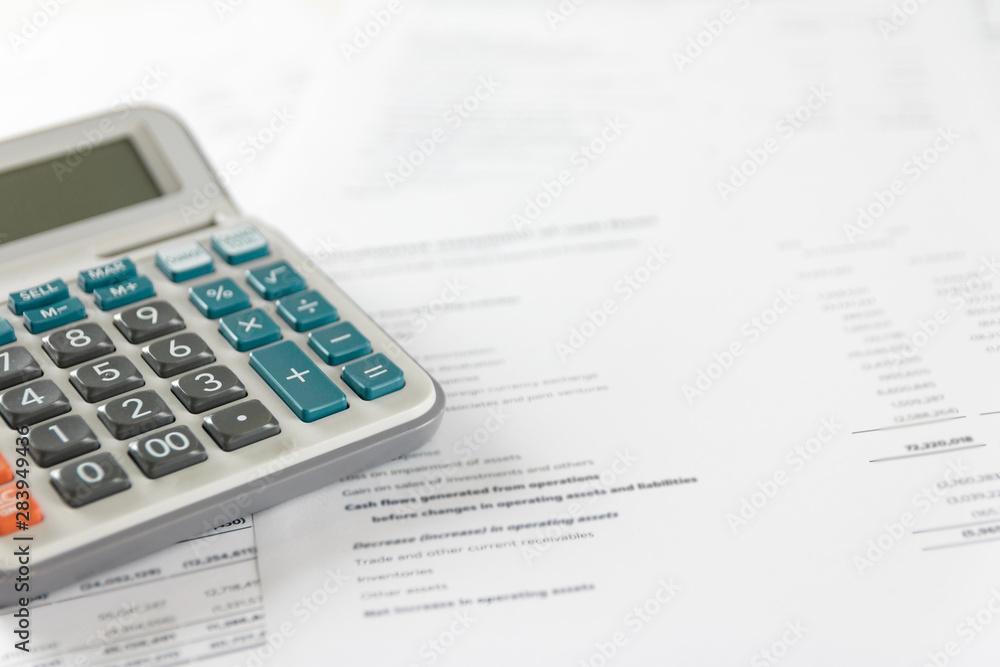 Pen calculator Business accounting documents placed on the table. Pen calculator Business accounting documents placed on the table.
