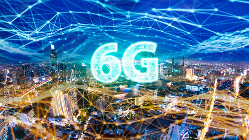 6G network digital hologram and internet of things on city background.6G network wireless systems. photo